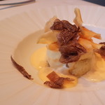 unito - 菊芋のスフォルマート　ラスケーラチーズのフォンデュ　黒トリュフがけ