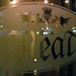 バー ニート 本店 - 入口のロゴ