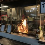 明神丸 - 【2016年10月】遠目に見る藁焼きファイアー(^^)