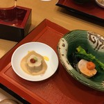 料理天国よし。 - お通しは胡麻豆腐とあん肝