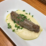 Torattoria Tsukiji Tomina - 自家製サルシッチャ。
                        ジャガイモのソースと相性バッチリ！