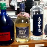 Torikyuu - カウンターの上のお酒