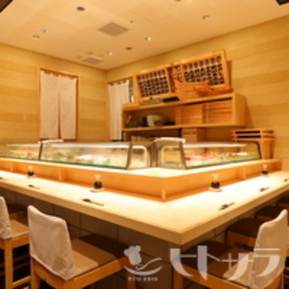 Enjoy Sushi in a restaurant that takes advantage of the texture of wood.