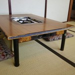 nakasuchinya - ガスコンロの設置されたテーブル
