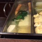 おかめ - 蛸とほうれん草煮込み中