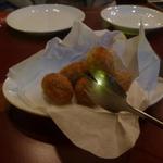 オステリア ブッコ - オリーブの肉詰フリット・・ブラックオリーブ