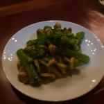 オステリア ブッコ - 菜の花とモンサンミシェルの巻貝のパスタ