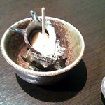 Kisshoutei Sushi Robata - お通し（サザエのつぼ焼き）