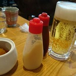 焼肉とステーキの店 ノースヒル 茨戸ガーデン - サービスの漬け物、ビール　ニンニクとコチュジャン