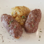 サンク・オ・ピエ - ジビエ尽くしのコース2017(6000円・外税)の対馬産イノシシの自家製皮無しソーセージ リンゴのモスタルダ添え