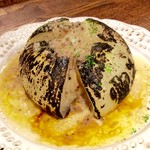 イタリアンバール ミーオ - 「淡路産 玉ねぎの丸ごとオーブン焼き アンチョビバターソース」(780円)。