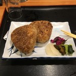 勇吉 - 焼きおにぎり。醤油しみしみで辛かった、、、