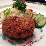 100% Wagyu minced meat cutlet with cheese and shiso leaves, red wine sauce
