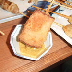 Kushimusubi Taku - カレー味の粉でアクセント。
