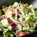 Caesar salad with colorful vegetables