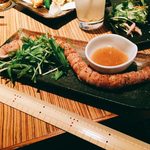 楽蔵 渋谷公園通り店 - rakuzou:一本葱の豚巻き炙り