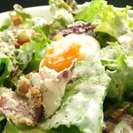 Caesar salad with soft-boiled eggs