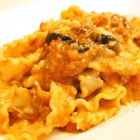 Ristorante IL FIGO INGORDO - ランチセット 1500円 のマファルディーネ ラム肩肉の煮込みとオリーブ