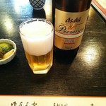 65499255 - 瓶ビールとお通しの漬け物