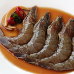 Prawns marinated in soy sauce, sashimi or grilled