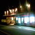 PIZZERIA DOMANI - 外観写真:夜の外観です。自動販売機が目印