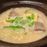 御料理 辰むら - 白味噌タンシチュー。黙って出されたら普通に和食、という味わい。手のひらで「パンっ」と叩いてぱらっと載せられた木の芽の香りがたまりません。