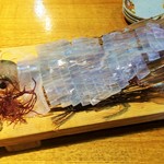 海鮮市場 長崎港 - 透明なイカ