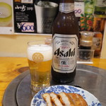 魚めい - 瓶ビールとさつま揚げのお通し