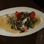 Assorted grilled seafood with butter tomato sauce