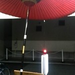 Ikuyoshi - お店の前におっきい番傘