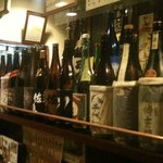 かっぱ - 【2011/2再訪】　カウンターの上にも焼酎が沢山並べられています。