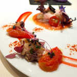 レストラン 間 - ドライトマトの酸味。柳ダコのキュッと締まった身が、白ワインを進ませる