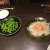 焼栄 - 料理写真:枝豆を炒めた物とサーモンのマリネ
