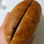 Pain au Traditionnel - つぶつぶチョコレートのコッペパン180円（外税）