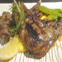 トラットリア ダイ パエサーニ - 骨付き仔羊肉のグリル　野菜添え（2／3）　￥2400？