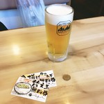 いちろくらーめん - この日は生ビール100円引き。どんたくの日の戦利品ともに。