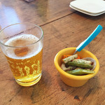 トーステッド - ハートランドの中瓶とお通し（ピクルス）
このお通しが和風の味付けで、すごく美味しかったです。