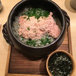 Earthenware pot rice with cod and whitebait