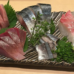 Assortment of four sashimi selection