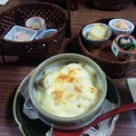 松見寿し - 手前がグラタンで温泉たまご入りでした。向こうには小さな器に一口ずつ違った味わいの料理