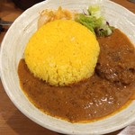 SPICY CURRY 魯珈 - 限定カレー 骨付きラムの辛口スープカレーのライス大盛