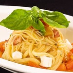 Cold capellini with fresh tomatoes, basil and mozzarella