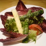 肉屋 雪月花 NAGOYA - 新玉ねぎのドレッシングのサラダ