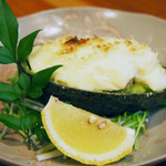 Avocado and white fish grilled with cheese