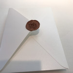 AMOUR - 封筒の中にはシェフのコメント付き本日のメニュー