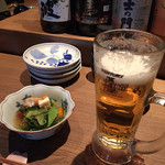 たま商店 - お通し。ビール飲みかけですみません！