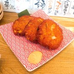 魚河岸酒場 FUKU浜金 - フグとトウモロコシのさつま揚げ天ぷら 580円