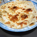 ユーカン - チャパティのアップ。薄焼きながらもっちりとしたパンです。