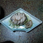 喜久屋 - アワビです。この他に焼牡蠣と煮魚、タコ　など…。
