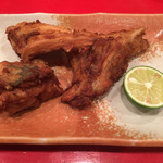 龍文支店 - 天然トラフグの唐揚げ。かぶりついて食べます。